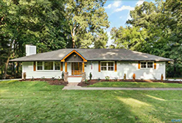 Ranch home exterior refresh with a cedar gable entry